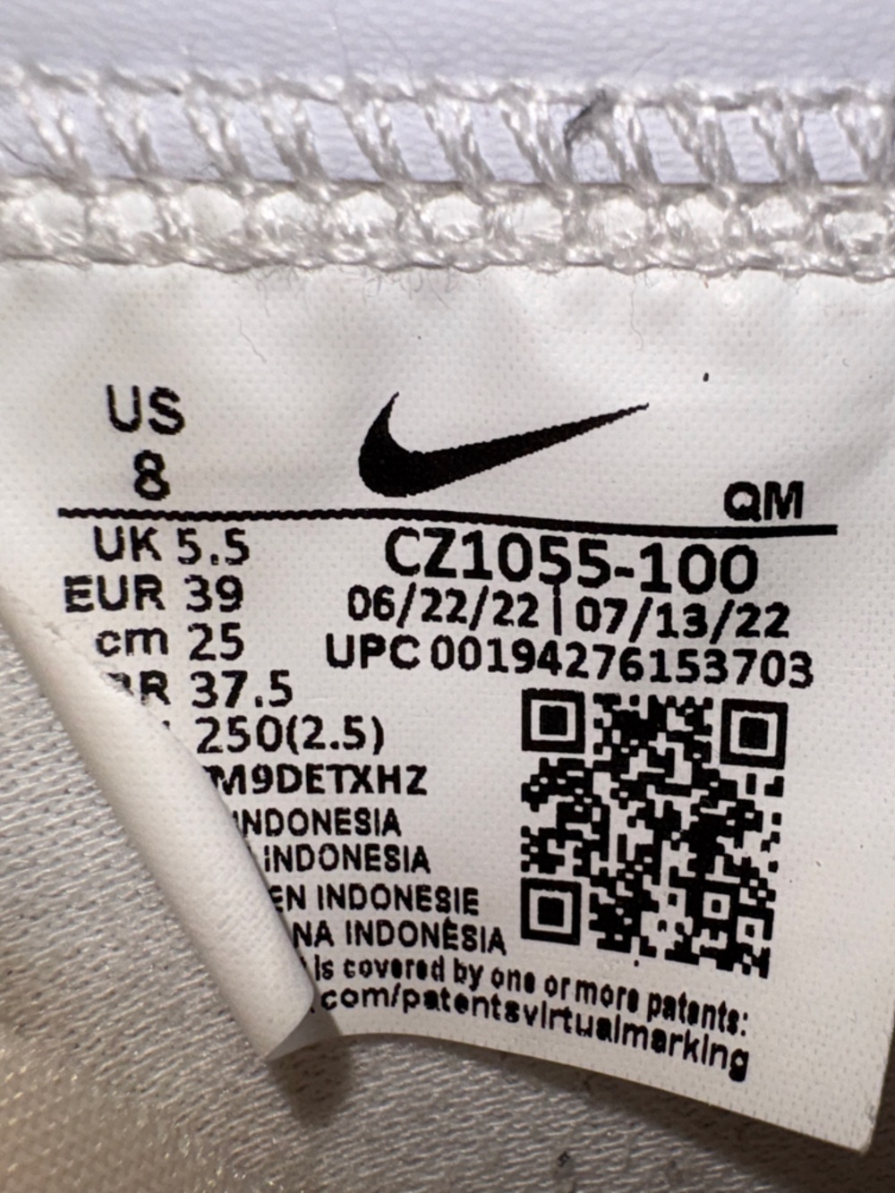 Nike Women's White High-Top Sneakers with Black Swoosh and Orange Logo Accents - Picture 6 of 6